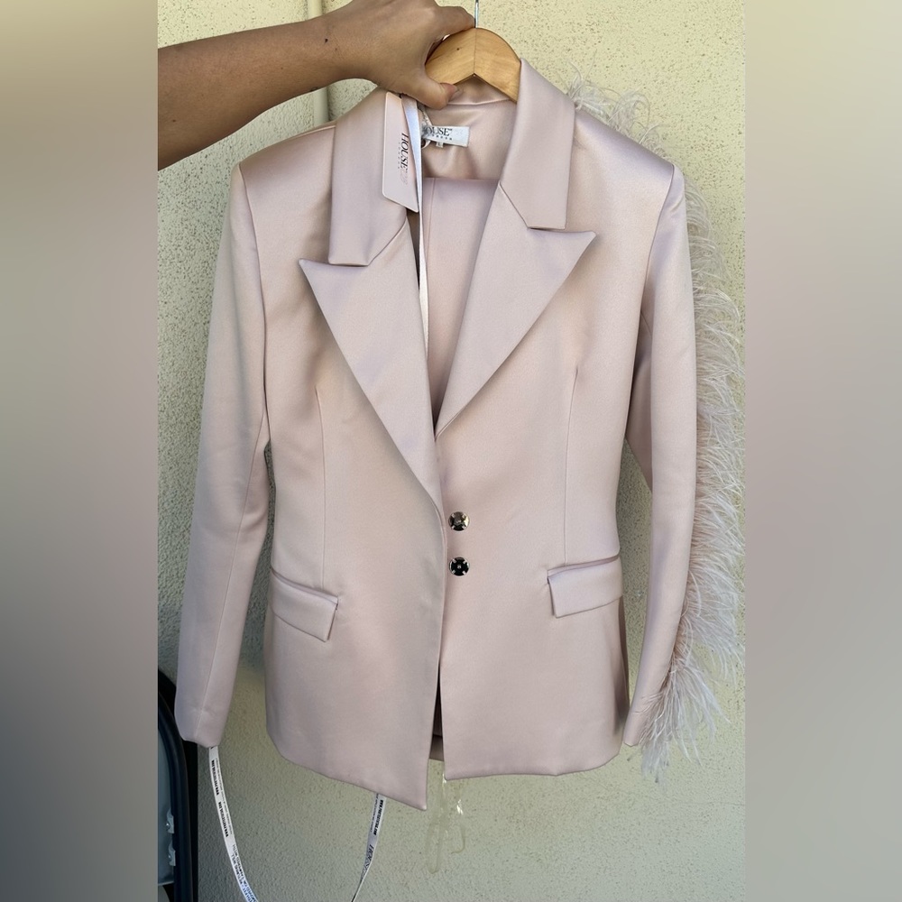 Light pink costume from Hous of SB
